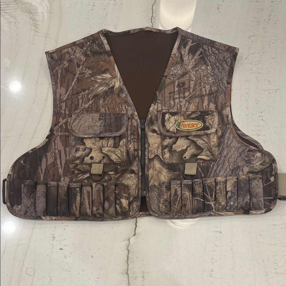 Avery neoprene shooting vest 
Mossy Oak Breakup camo